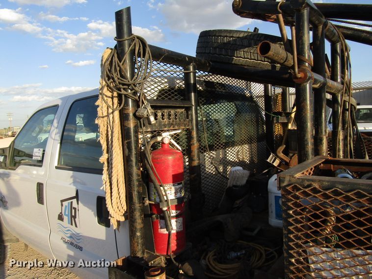 image for item DG1406 2016 Ford F550 Super Duty Crew Cab flatbed truck