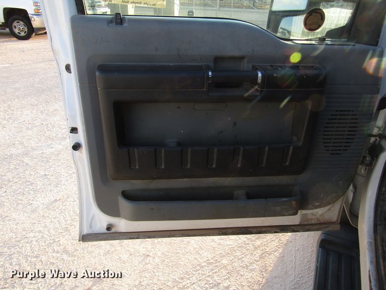 image for item DG1407 2014 Ford F550 Super Duty Crew Cab flatbed truck