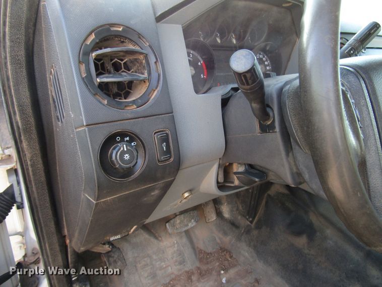 image for item DG1407 2014 Ford F550 Super Duty Crew Cab flatbed truck