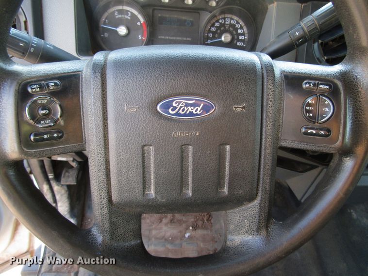 image for item DG1407 2014 Ford F550 Super Duty Crew Cab flatbed truck