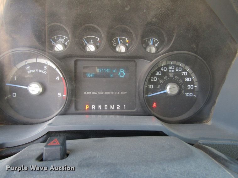 image for item DG1407 2014 Ford F550 Super Duty Crew Cab flatbed truck