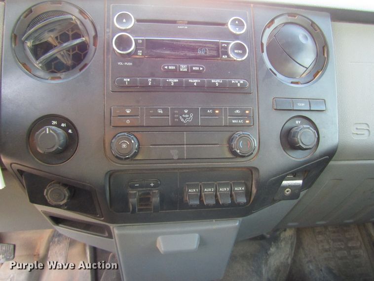 image for item DG1407 2014 Ford F550 Super Duty Crew Cab flatbed truck