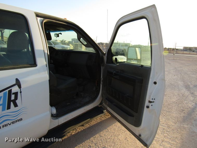 image for item DG1407 2014 Ford F550 Super Duty Crew Cab flatbed truck