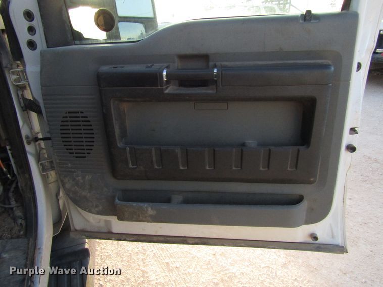 image for item DG1407 2014 Ford F550 Super Duty Crew Cab flatbed truck