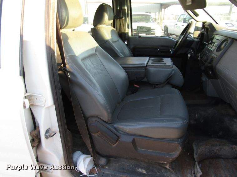 image for item DG1407 2014 Ford F550 Super Duty Crew Cab flatbed truck