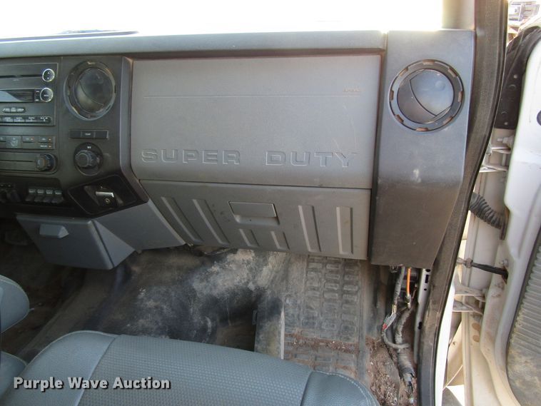 image for item DG1407 2014 Ford F550 Super Duty Crew Cab flatbed truck