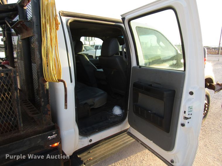 image for item DG1407 2014 Ford F550 Super Duty Crew Cab flatbed truck