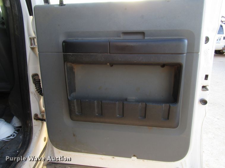 image for item DG1407 2014 Ford F550 Super Duty Crew Cab flatbed truck