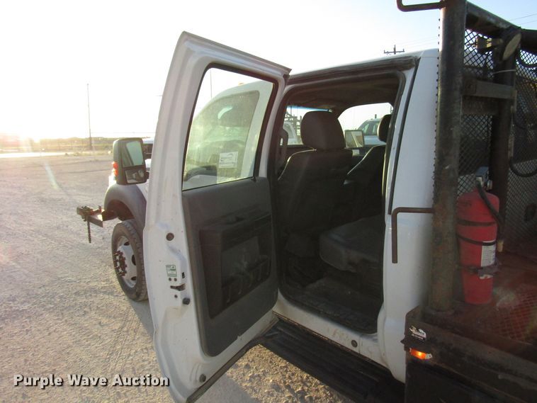 image for item DG1407 2014 Ford F550 Super Duty Crew Cab flatbed truck