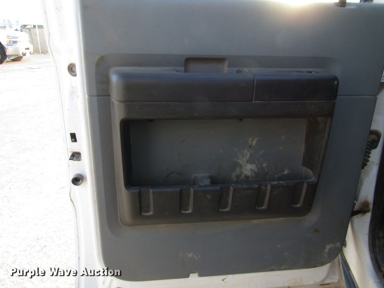 image for item DG1407 2014 Ford F550 Super Duty Crew Cab flatbed truck