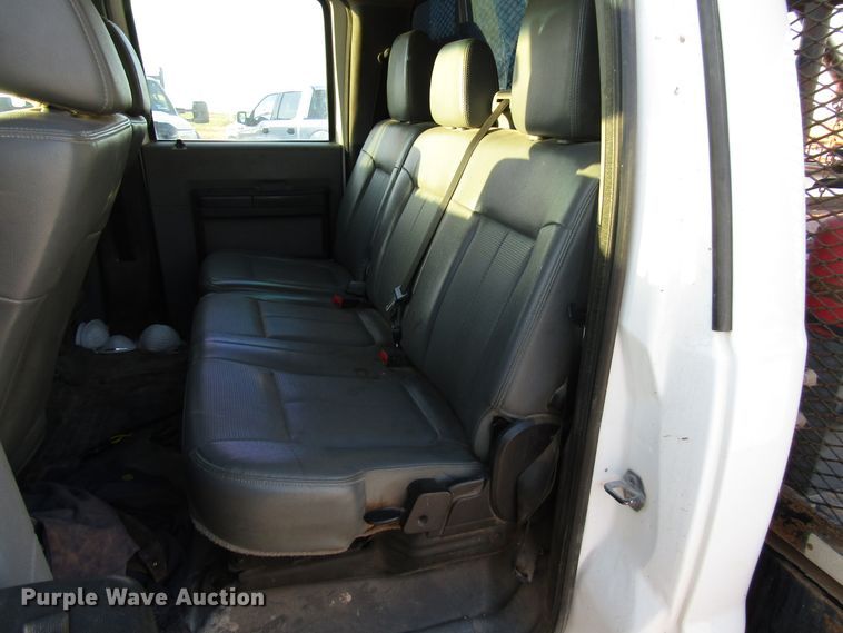 image for item DG1407 2014 Ford F550 Super Duty Crew Cab flatbed truck