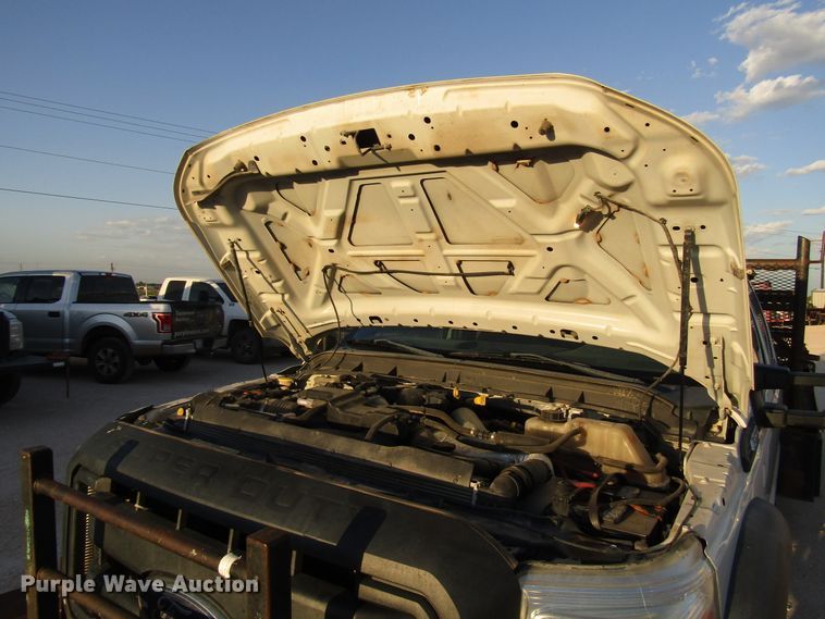 image for item DG1407 2014 Ford F550 Super Duty Crew Cab flatbed truck