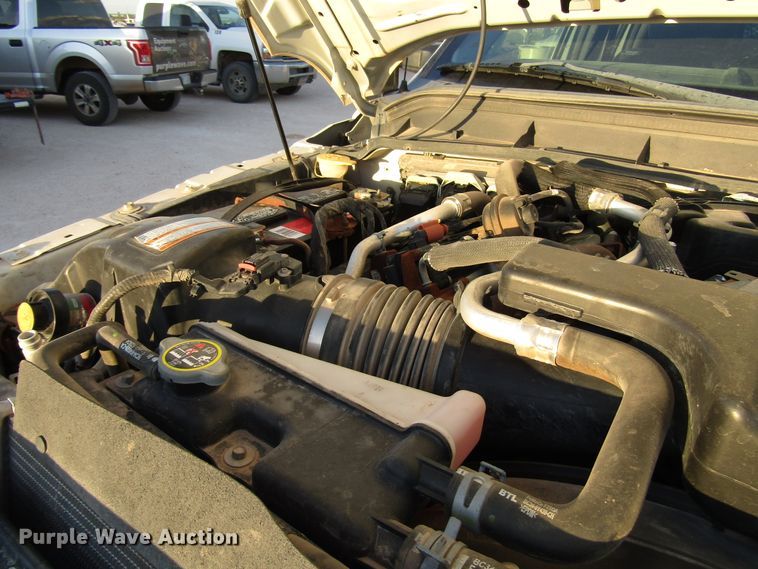 image for item DG1407 2014 Ford F550 Super Duty Crew Cab flatbed truck