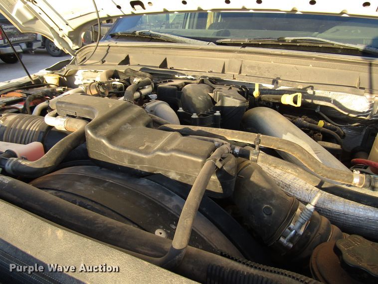 image for item DG1407 2014 Ford F550 Super Duty Crew Cab flatbed truck