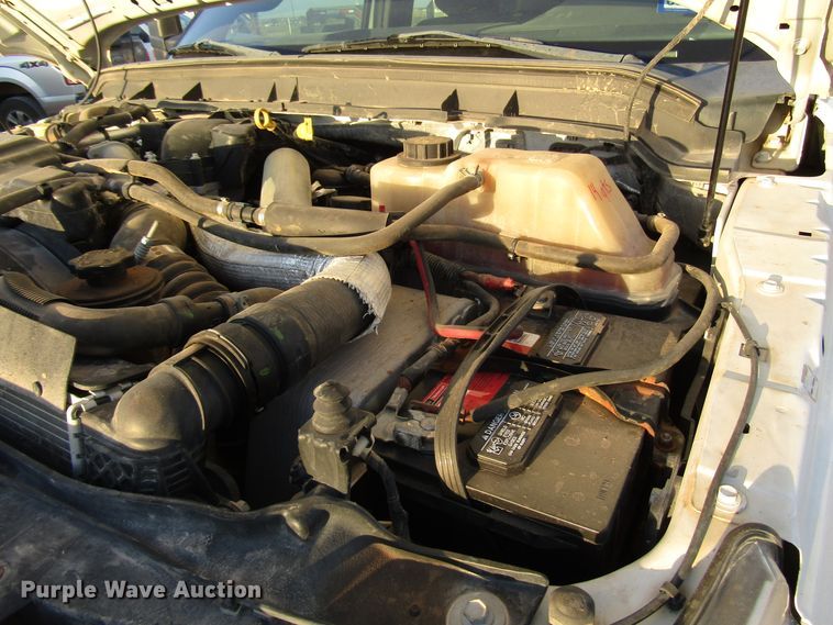 image for item DG1407 2014 Ford F550 Super Duty Crew Cab flatbed truck