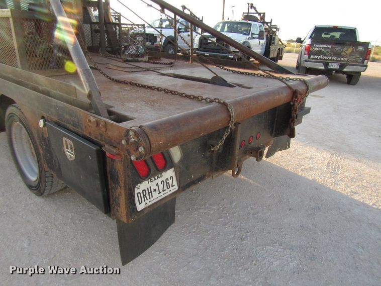 image for item DG1407 2014 Ford F550 Super Duty Crew Cab flatbed truck