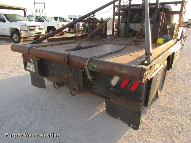 image for item DG1407 2014 Ford F550 Super Duty Crew Cab flatbed truck