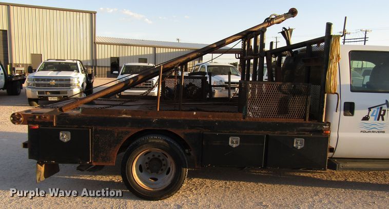 image for item DG1407 2014 Ford F550 Super Duty Crew Cab flatbed truck