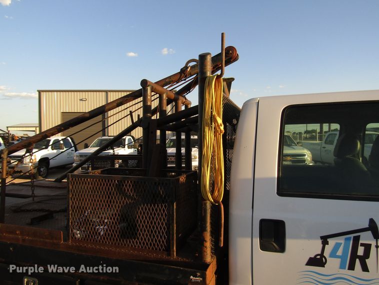 image for item DG1407 2014 Ford F550 Super Duty Crew Cab flatbed truck