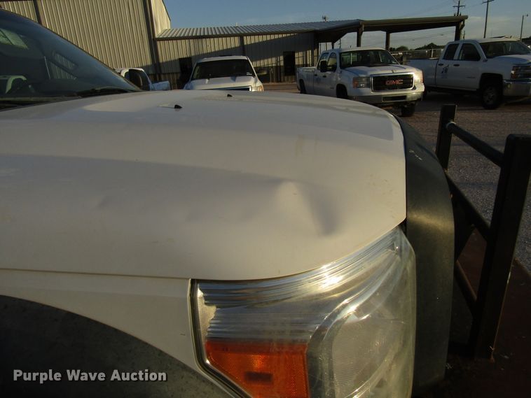 image for item DG1407 2014 Ford F550 Super Duty Crew Cab flatbed truck