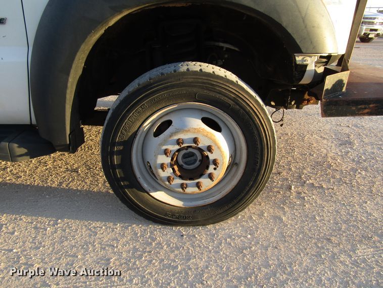 image for item DG1407 2014 Ford F550 Super Duty Crew Cab flatbed truck