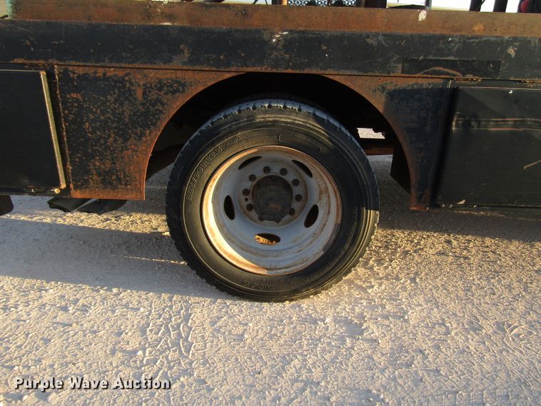 image for item DG1407 2014 Ford F550 Super Duty Crew Cab flatbed truck