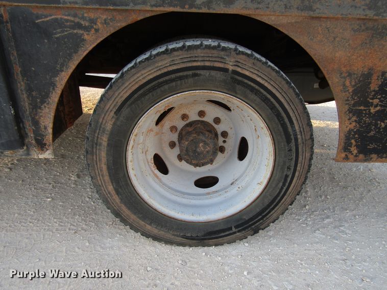 image for item DG1407 2014 Ford F550 Super Duty Crew Cab flatbed truck