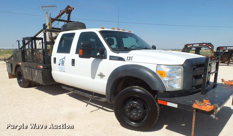 image for item FL9394 2014 Ford F550 Super Duty Crew Cab flatbed truck