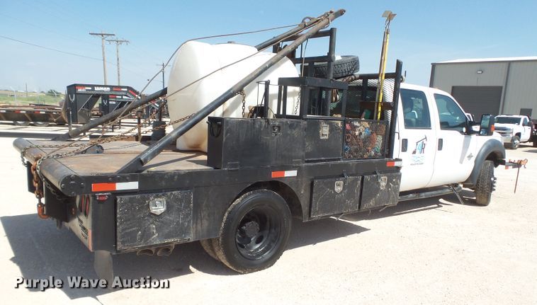image for item FL9394 2014 Ford F550 Super Duty Crew Cab flatbed truck