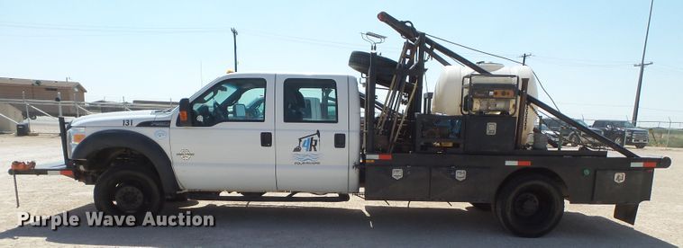 image for item FL9394 2014 Ford F550 Super Duty Crew Cab flatbed truck