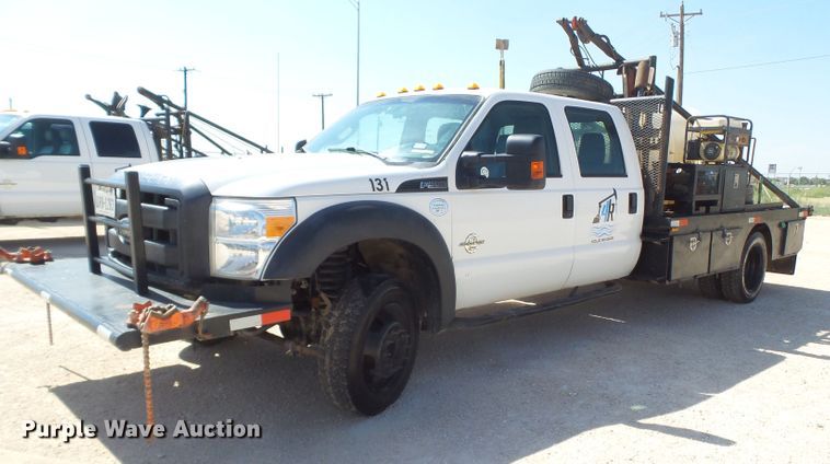 image for item FL9394 2014 Ford F550 Super Duty Crew Cab flatbed truck