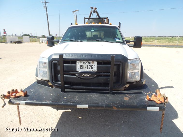 image for item FL9394 2014 Ford F550 Super Duty Crew Cab flatbed truck