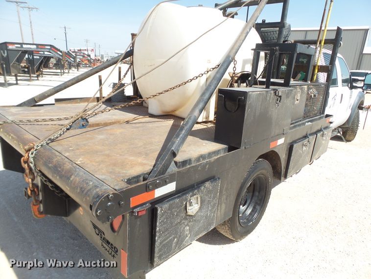 image for item FL9394 2014 Ford F550 Super Duty Crew Cab flatbed truck