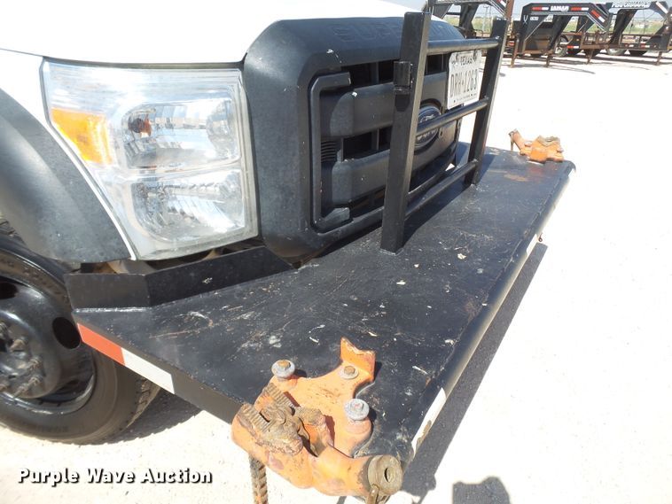 image for item FL9394 2014 Ford F550 Super Duty Crew Cab flatbed truck