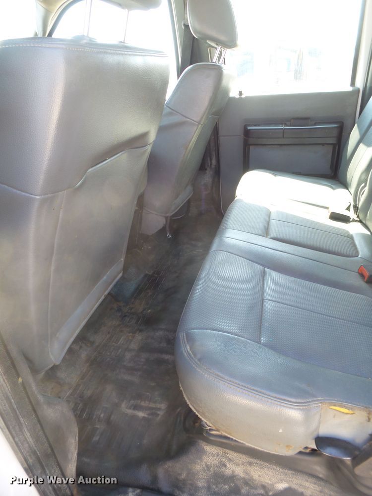 image for item FL9394 2014 Ford F550 Super Duty Crew Cab flatbed truck