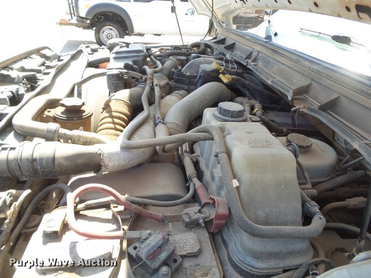 image for item FL9394 2014 Ford F550 Super Duty Crew Cab flatbed truck