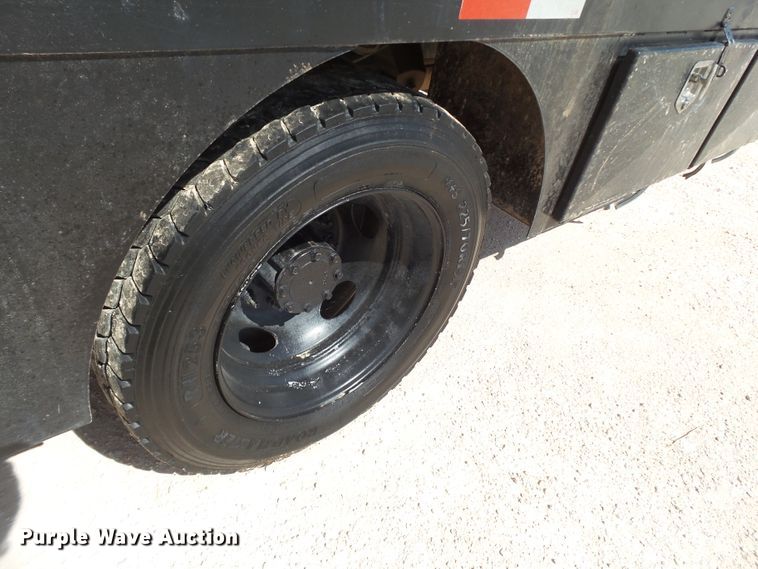 image for item FL9394 2014 Ford F550 Super Duty Crew Cab flatbed truck