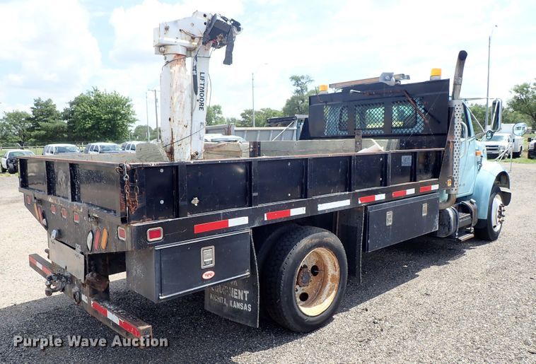 image for item DE0868 2002 International 4700 flatbed truck with crane