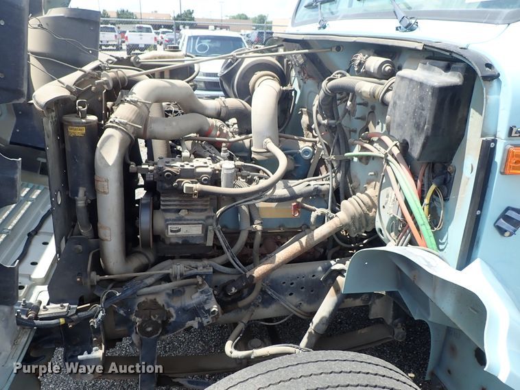 image for item DE0868 2002 International 4700 flatbed truck with crane