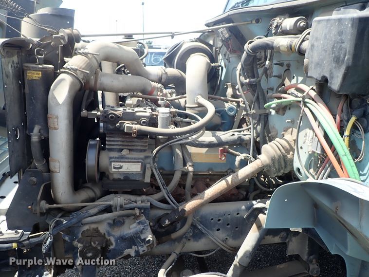 image for item DE0868 2002 International 4700 flatbed truck with crane