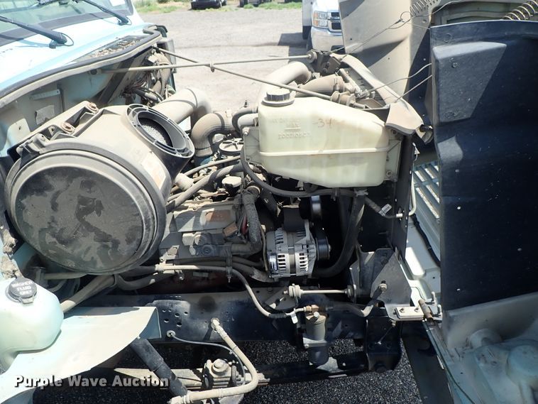 image for item DE0868 2002 International 4700 flatbed truck with crane