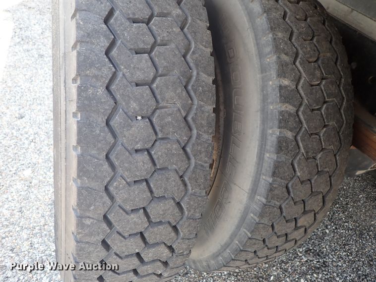 image for item DE0868 2002 International 4700 flatbed truck with crane