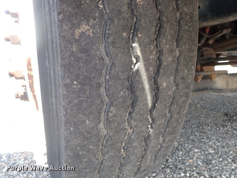 image for item DE0868 2002 International 4700 flatbed truck with crane