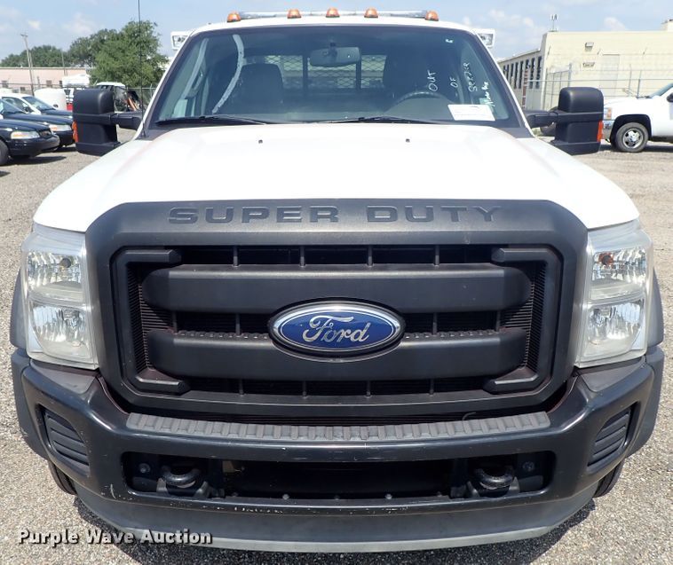 image for item DE0872 2011 Ford F550 Super Duty XL SuperCab utility bed truck with crane