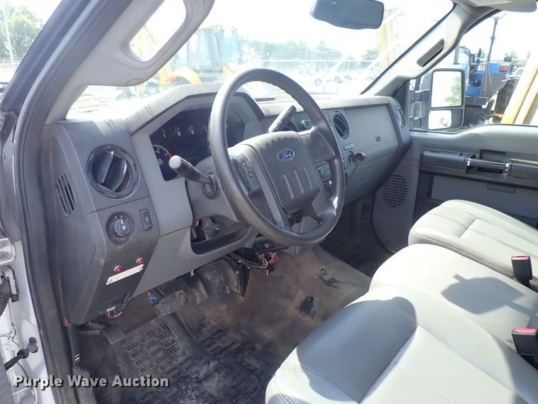 image for item DE0872 2011 Ford F550 Super Duty XL SuperCab utility bed truck with crane