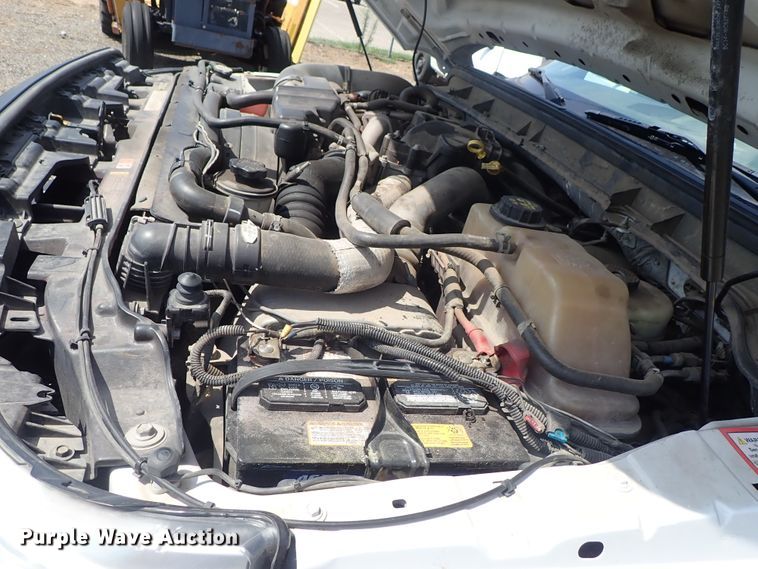 image for item DE0872 2011 Ford F550 Super Duty XL SuperCab utility bed truck with crane