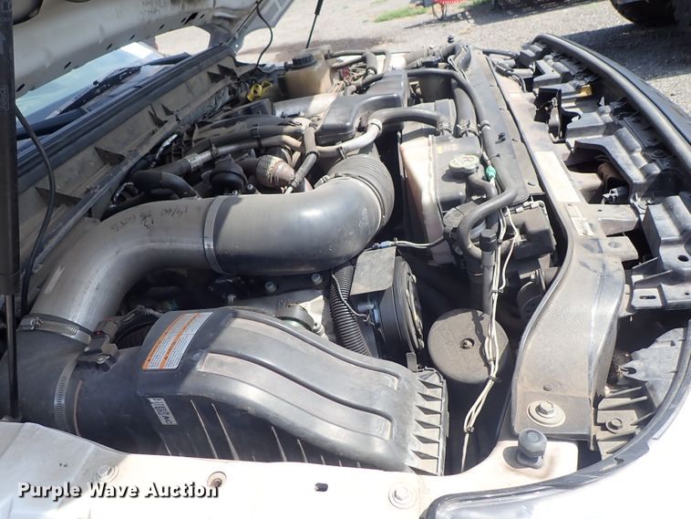 image for item DE0872 2011 Ford F550 Super Duty XL SuperCab utility bed truck with crane