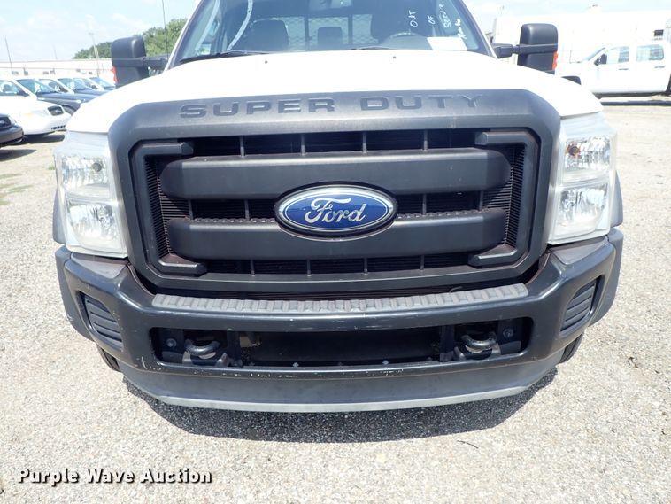 image for item DE0872 2011 Ford F550 Super Duty XL SuperCab utility bed truck with crane