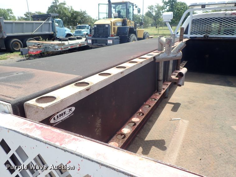 image for item DE0872 2011 Ford F550 Super Duty XL SuperCab utility bed truck with crane