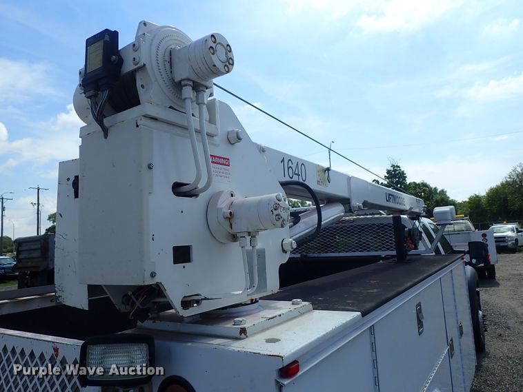 image for item DE0872 2011 Ford F550 Super Duty XL SuperCab utility bed truck with crane